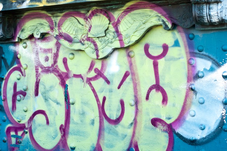 Such pretty flourishes - and such flat paint covering them. 